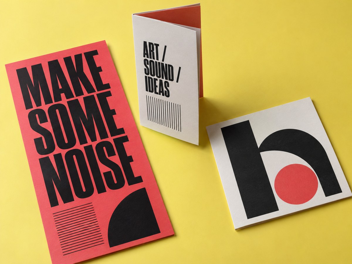 Original Make Some Noise identity concept across a card, folded program and square print